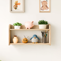 Natural wooden two-level wall shelf filled with plants and decor, ideal for organizing in a child's room or modern space.