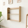 Empty Montessori wall-mounted shelf made of birch plywood, perfect for organizing toys, books, and decorations in a minimalist nursery.